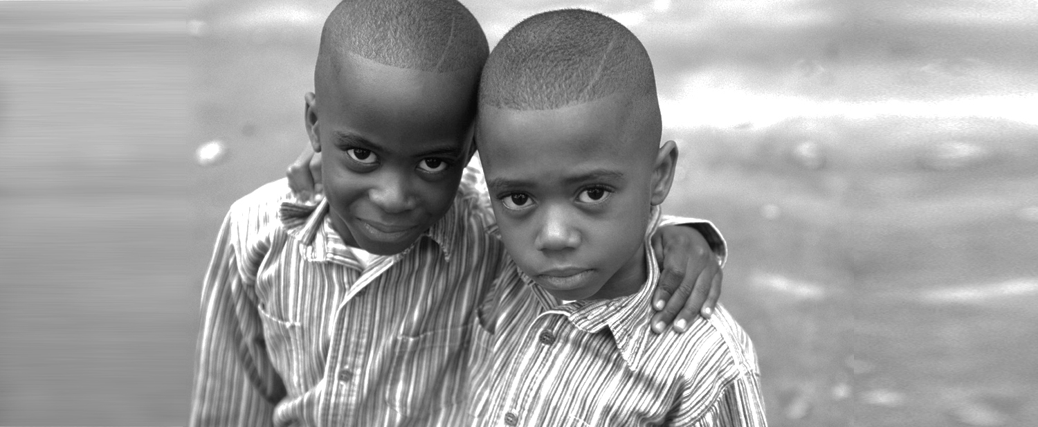 Group of diverse smiling children — representing the children served by The Franklin Law Group